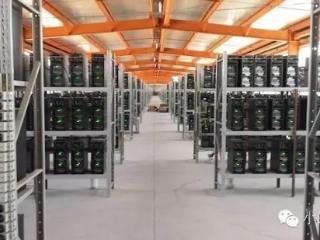 Vast mining farm facility with rows of ASIC miners